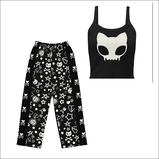 Image shows tank top and pajama pants against a white background. The tank top features a large cute cat skull in white and the pants are covered in a handdrawn print of stars hearts and poorly drawn kitty skulls with crossbones 