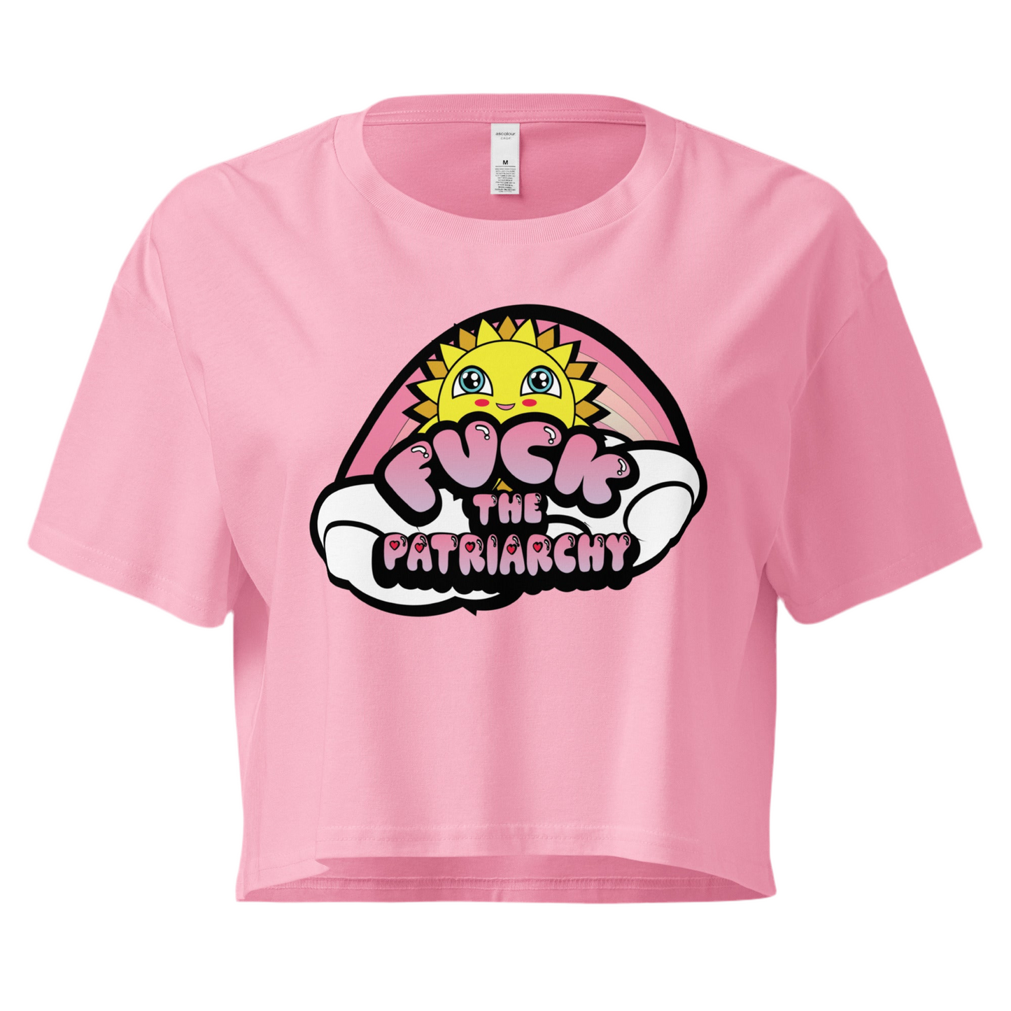 Image shows light pink crop top with graphic that says “fuck the patriarchy” in bubble letters surrounded by a cute happy sun, clouds and a rainbow 