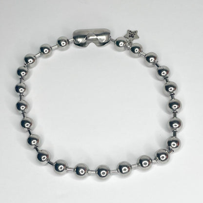 Image shows a top view of the 12 millimeter ball chain necklace against a white background 