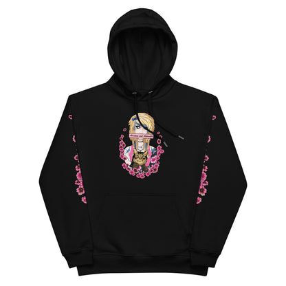 This black hoodie features a graphic of a punk tattooed girl holding a cat over her mouth is a label that says adorable and anxious. She is framed by flowers 